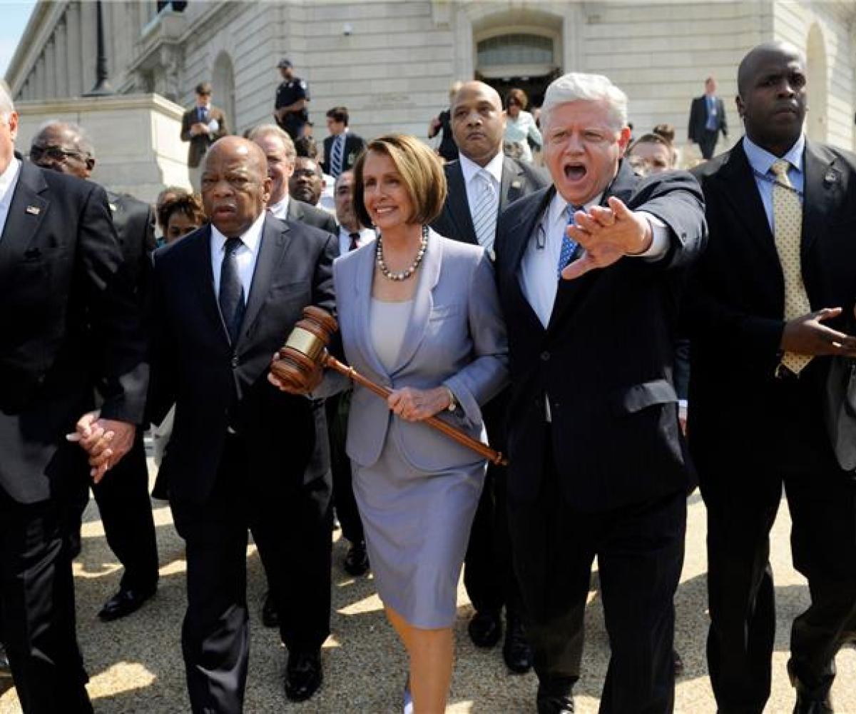 Rep. Larson walks with Speaker Pelosi and their colleagues during the passage of the Affordable Care Act in 2010.
