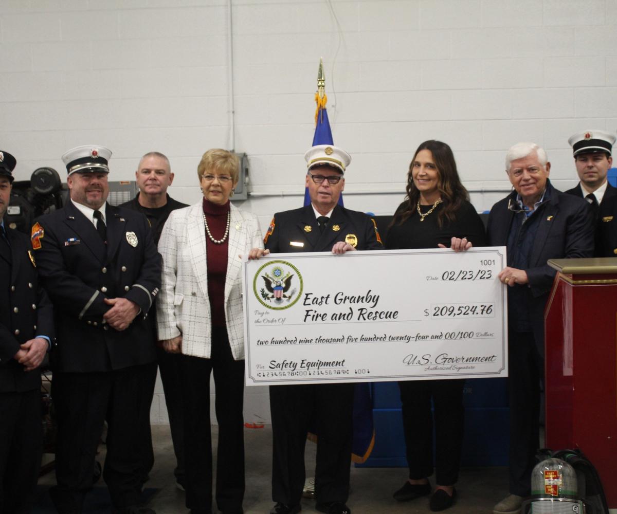 East Granby Selectman Steve Hall, State Representative Tami Zawistowski, Fire Chief Kerry Flaherty, First Selectwoman Eden Wimpfheimer, Rep. Larson, and East Granby Volunteer Firefighters 