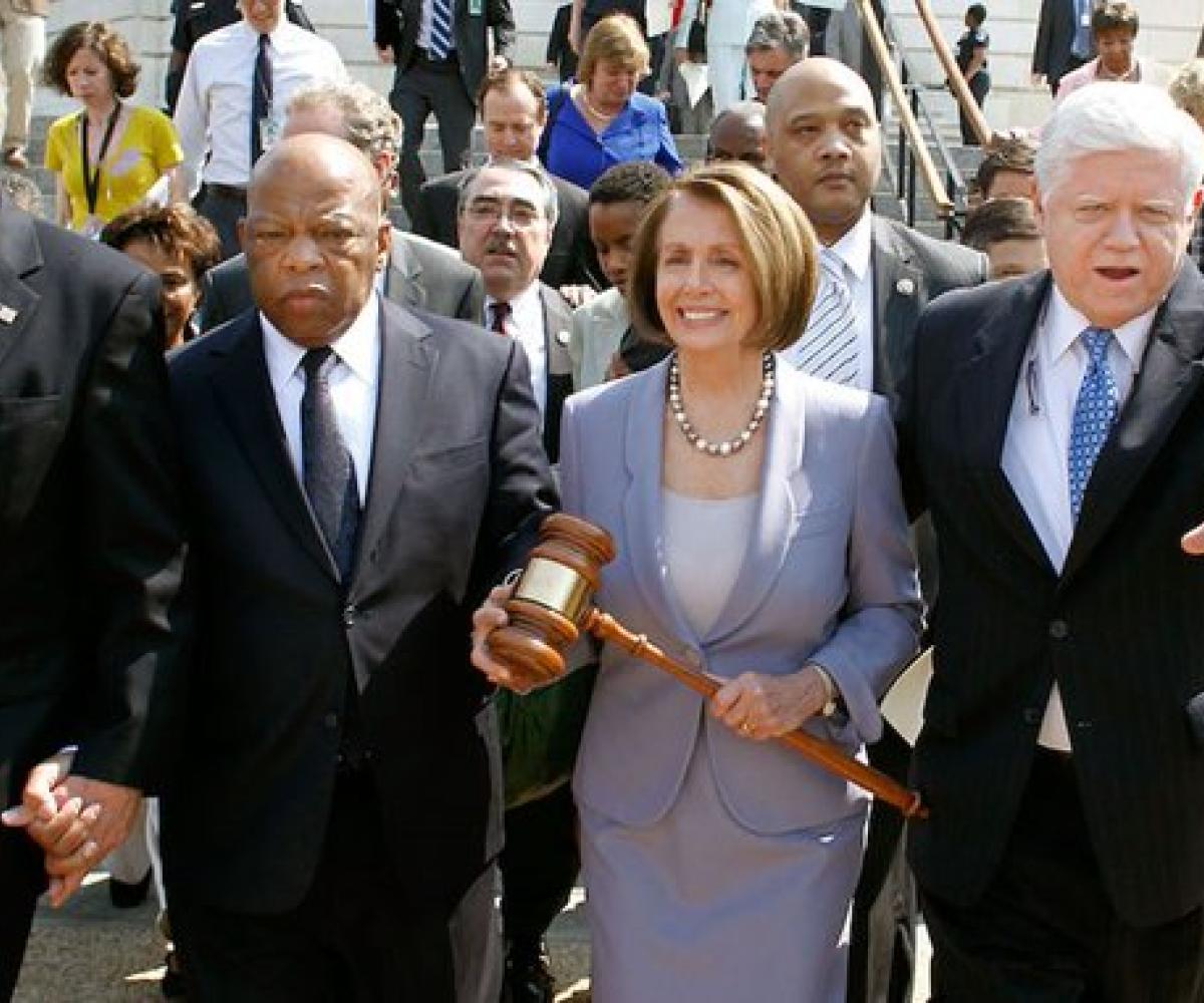 Rep. Larson walks with Speaker Pelosi and their colleagues during the passage of the Affordable Care Act in 2010.