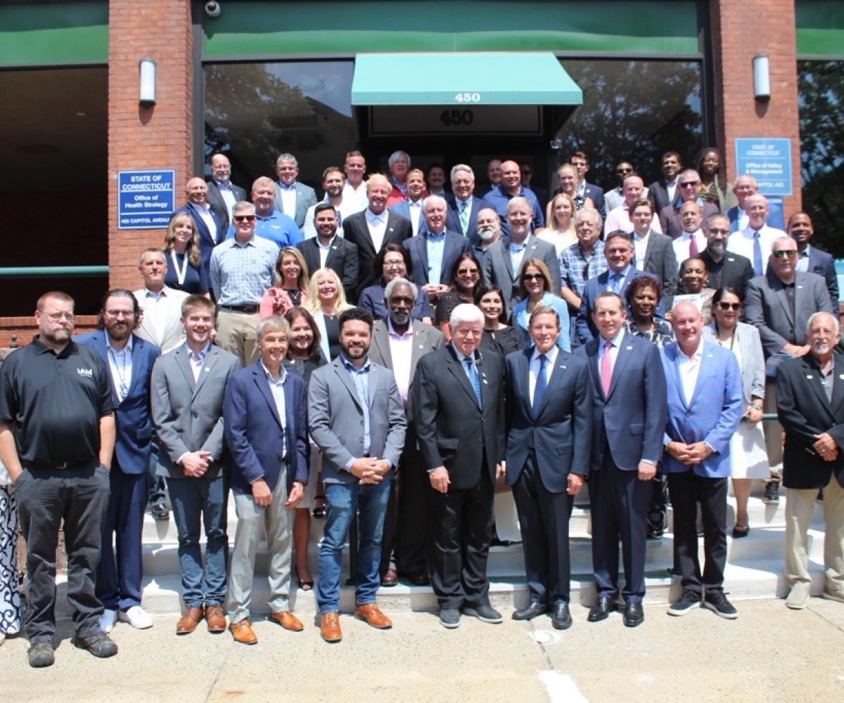 Rep. Larson and Senator Blumenthal with Pratt & Whitney leaders and local officials in Hartford