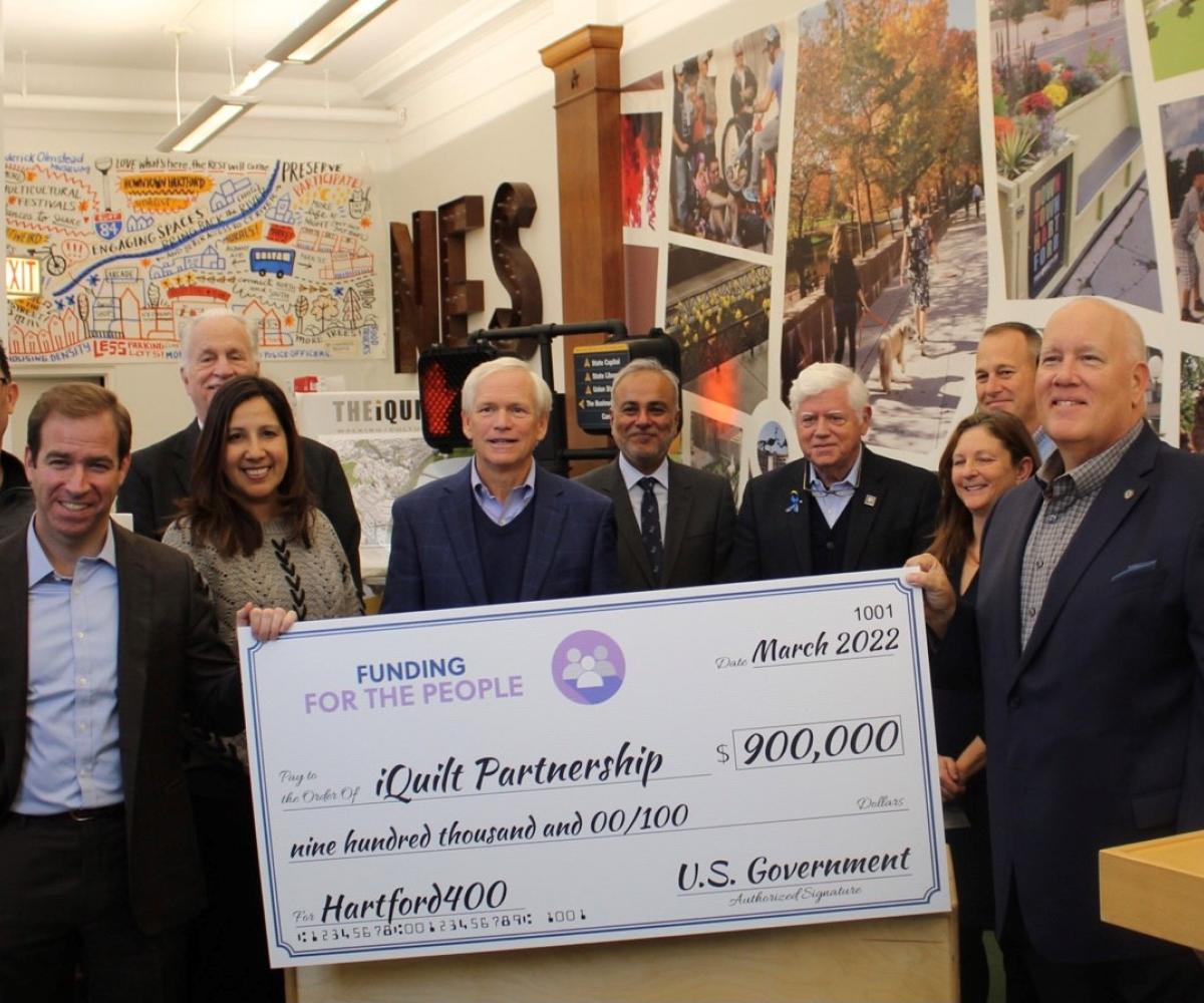 Hartford Mayor Luke Bronin, iQuilt Partnership Board members, State Senator Saud Anwar, Rep. Larson, Riverfront Recapture President & CEO Michael Zaleski, Hartford Foundation for Public Giving Vice President for Community Impact Elysa Gordon, East Hartford Mayor Mike Walsh 