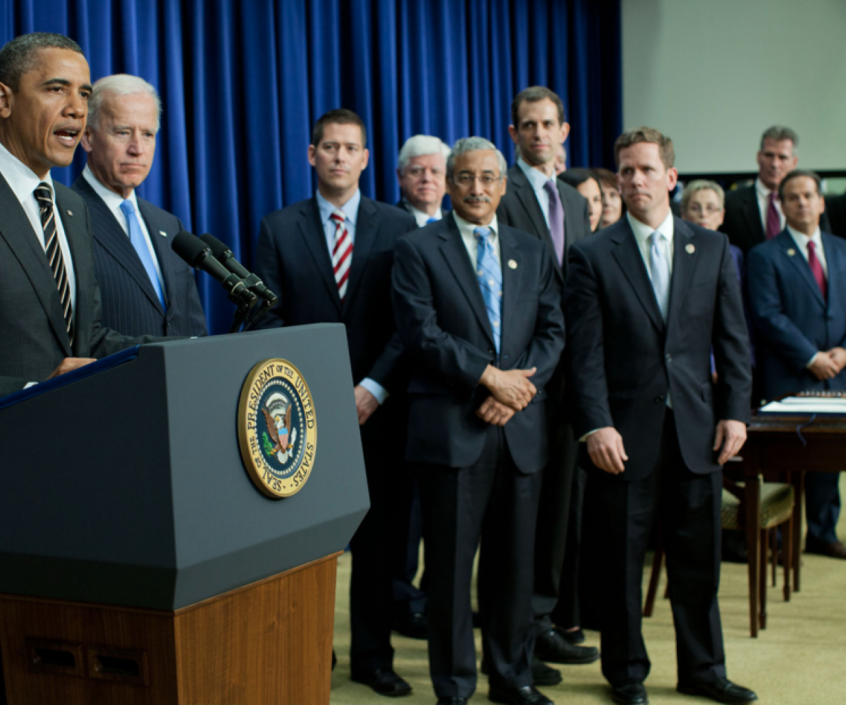 Rep. Larson joined his colleagues at the White House in 2012 when President Obama signed their STOCK Act into law (Official White House photo by Pete Souza)