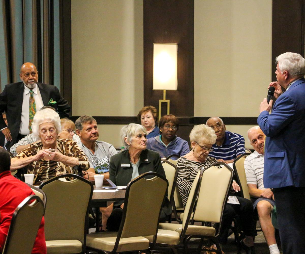 Reps. Larson and Alcee Hastings speak with seniors