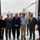 Rep. Larson and the Kaman team in front of the K-MAX helicopter