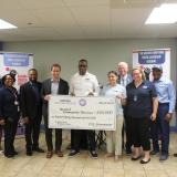 Hartford Mayor Luke Bronin, Hartford Communities That Care Executive Director Andrew Woods, and Rep. Larson