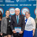 Rep. Larson receives the John Lewis Bridge to Service Award with Connecticut AmeriCorps volunteers and staff 