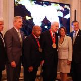Pictured right to left: Rep. Larson, Majority Leader Kevin McCarthy (CA-23), Rep. Lewis, Rep. Johnson, Minority Leader Nancy Pelosi (CA-12), Rep. Tom Cole (OK-04), and BPC President Jason Grumet.