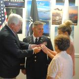 Rep. Larson presents Patrick Nelligan with medals