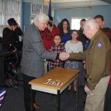 Rep. Larson presents Mr. Harold Wing with the medals he earned in WWII