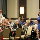 Reps. Larson and Alcee Hastings speak with seniors