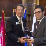 Dave Sitcovsky receives the Colonel Paul W. Arcari Meritorious Service Award.