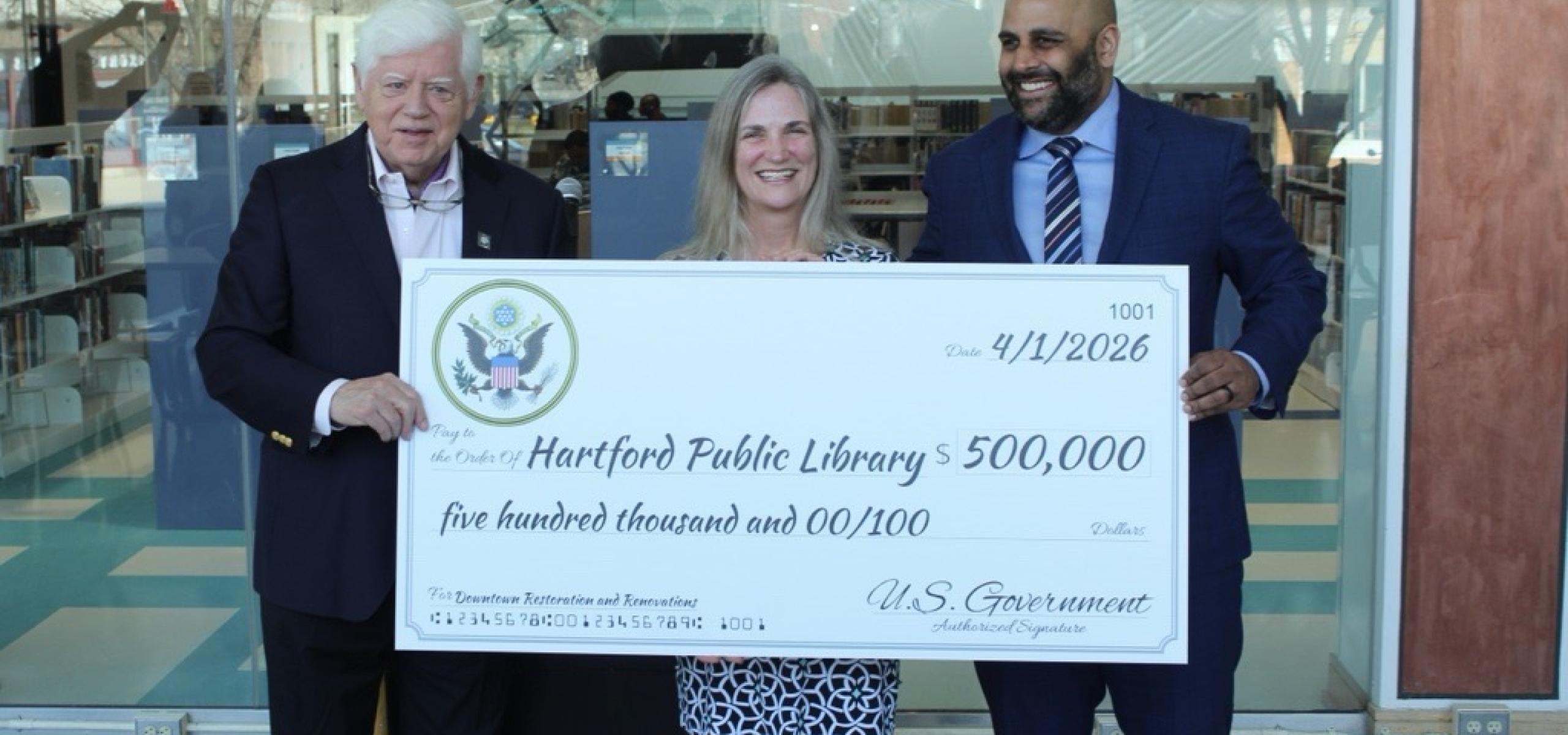 Rep. Larson, Hartford Public Library President and CEO Bridget Quinn, and Hartford Mayor Arunan Arulampalam 