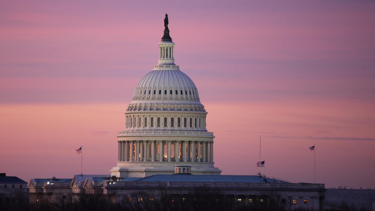 The United States capitol dome at dawn