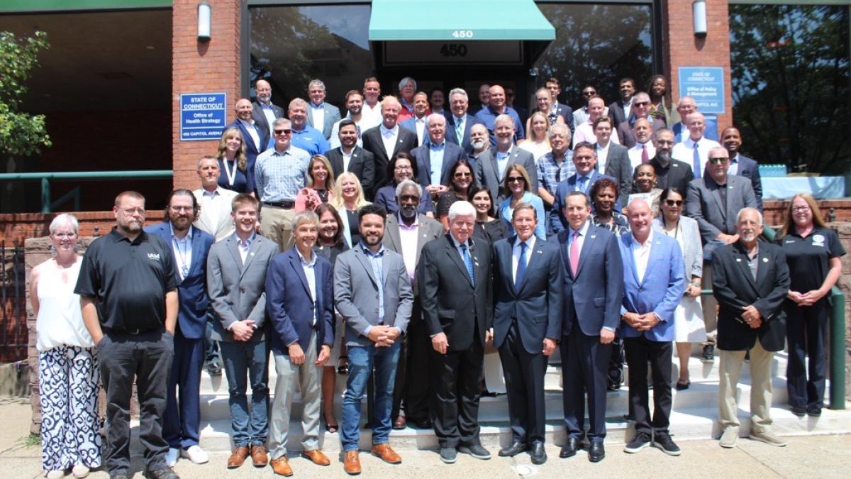 Rep. Larson and Senator Blumenthal with Pratt & Whitney leaders and local officials in Hartford