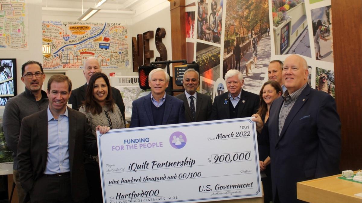 Hartford Mayor Luke Bronin, iQuilt Partnership Board members, State Senator Saud Anwar, Rep. Larson, Riverfront Recapture President & CEO Michael Zaleski, Hartford Foundation for Public Giving Vice President for Community Impact Elysa Gordon, East Hartford Mayor Mike Walsh