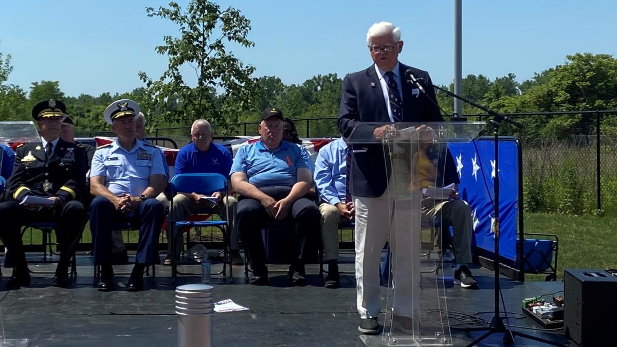 Brigadier General John Lawlor (Retired), Admiral Karl Schultz (Commandant of the Coast Guard), Chris Larson, East Hartford Mayor Mike Walsh, and Rep. Larson  