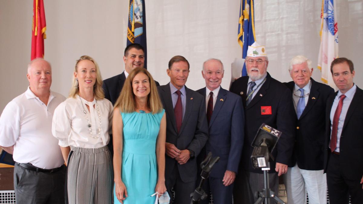 U.S. Marine Corps Veteran Paul Barry, State Representative Kerry Wood, Lt. Governor Susan Bysiewicz, State Representative Gary Turco, Senator Richard Blumenthal, Rep. Joe Courtney, American Legion Connecticut Department Service Officer K. Robert Lewis, Rep. Larson, and Hartford Mayor Luke Bronin