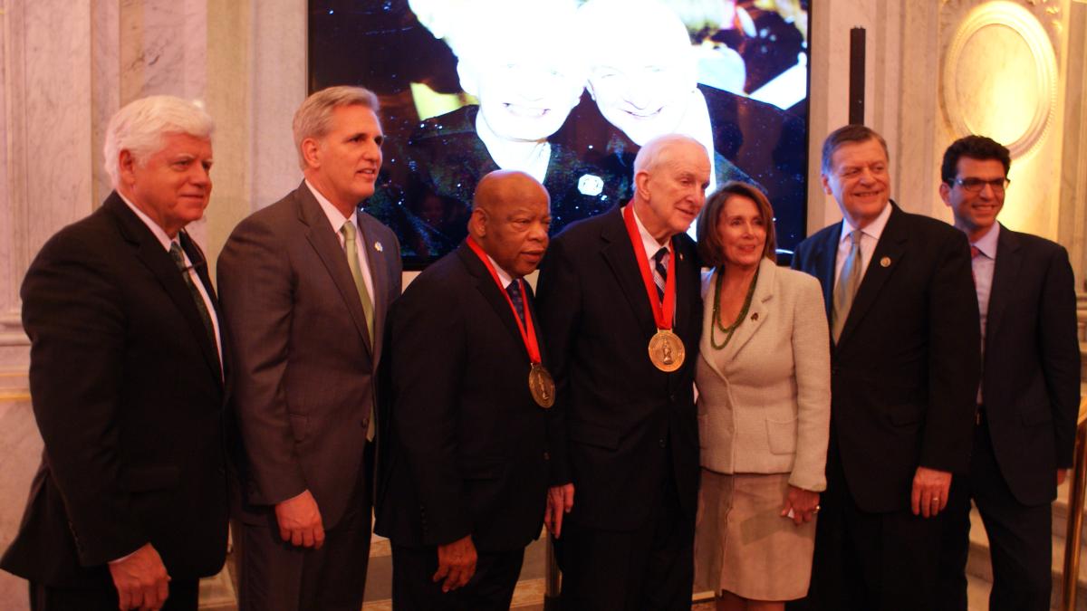 Pictured right to left: Rep. Larson, Majority Leader Kevin McCarthy (CA-23), Rep. Lewis, Rep. Johnson, Minority Leader Nancy Pelosi (CA-12), Rep. Tom Cole (OK-04), and BPC President Jason Grumet.