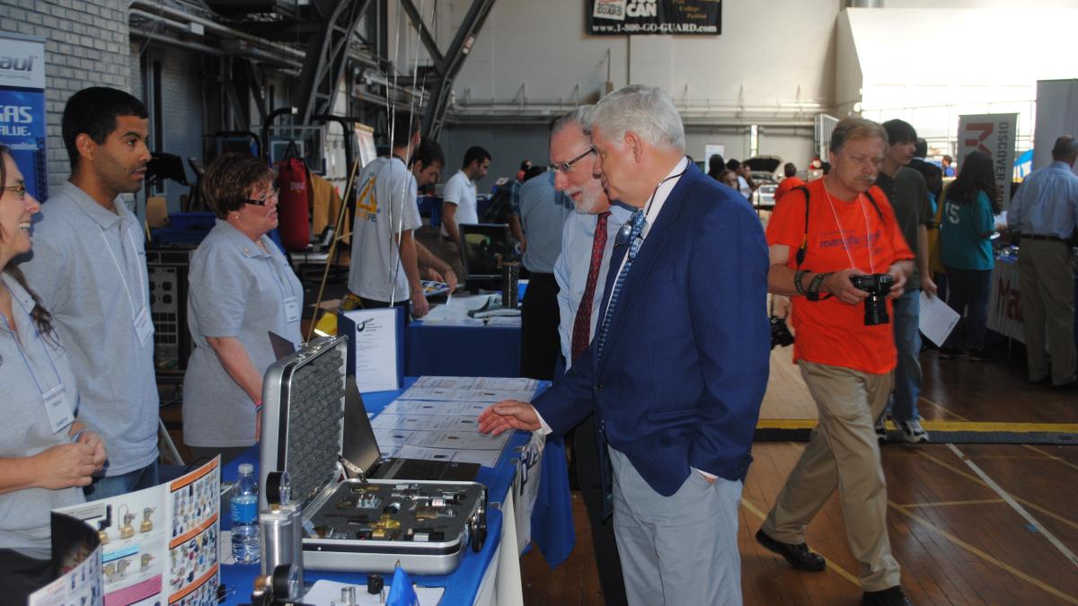 Larson and Elliot Ginsberg attend Manufacturing Mania Day