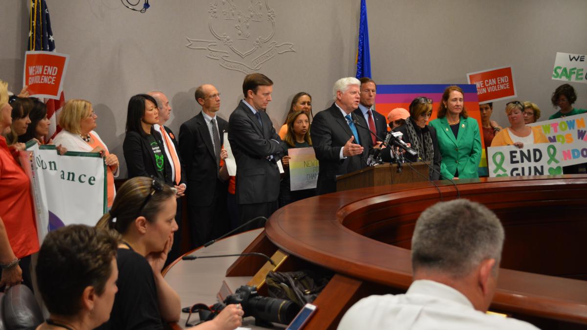 Rep. Larson speaks at a press conference on ending gun violence