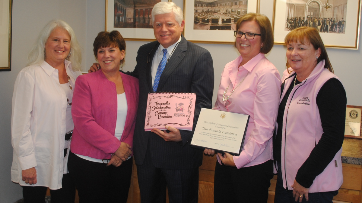 Larson presents the Nancy Pilver Award to Team Towanda