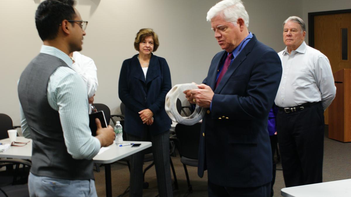 Rep. Larson inspects the work of entrepreneurs in CCAT’s incubator program.