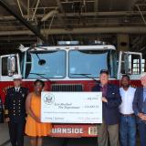 State Rep. Henry Genga, East Hartford Fire Chief Kevin Munson, Councilwoman Sebrina Wilson, Mayor Mike Walsh, Councilman Awet Tsegai, Rep. Larson, and Assistant Fire Chief Stephen Alsup