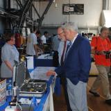 Larson and Elliot Ginsberg attend Manufacturing Mania Day