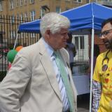 Rep. Larson speaks with a doctor at a Community Health Fair in Hartford