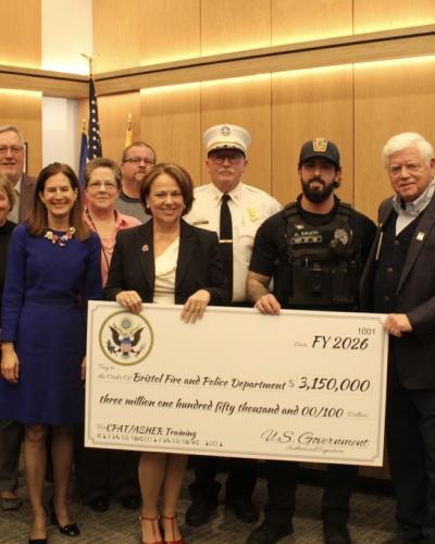 Lt. Governor Susan Bysiewicz, State Rep. Mary Fortier, Bristol Fire Chief Richard Hart, Officer Alec Iurato, Rep. Larson, Chief of Police Mark Morello, and members of the Bristol City Council